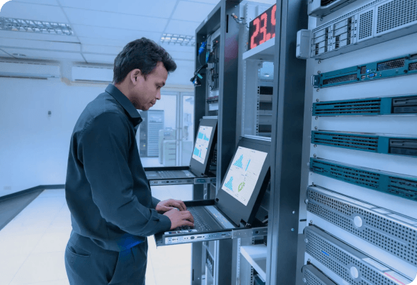 IT professional working in server room